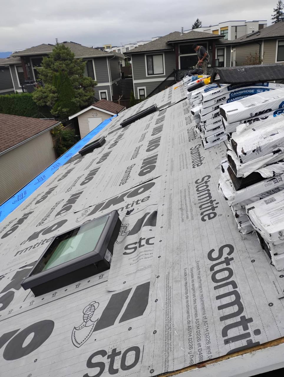 Residential roof fully papered with IKO Stormtite synthetic underlayment ready to be shingled in Chilliwack BC by Fraser Roofing
