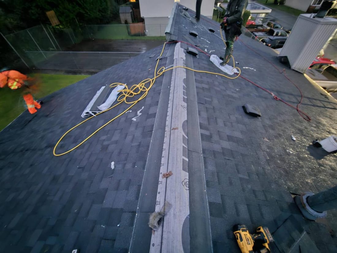 Fraser Roofing crew completing a residential shingle roof in Chilliwack BC