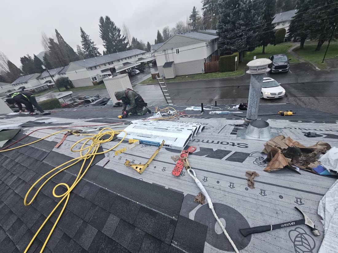 Fraser Roofing crew member shingling a large residential roof job, demonstrating the scale of work we handle for Hope and Fraser Valley homeowners