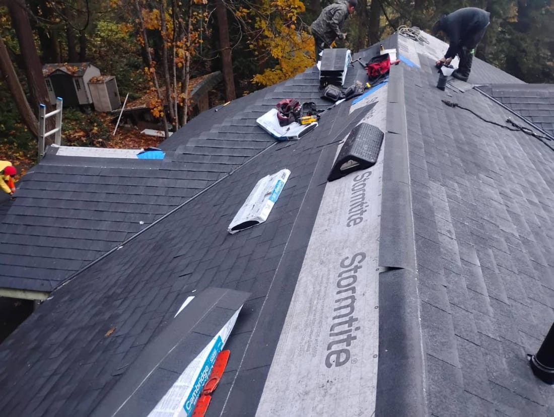 Near-complete shingled roof with clean installation showing valley and ridge details in Chilliwack BC by Fraser Roofing