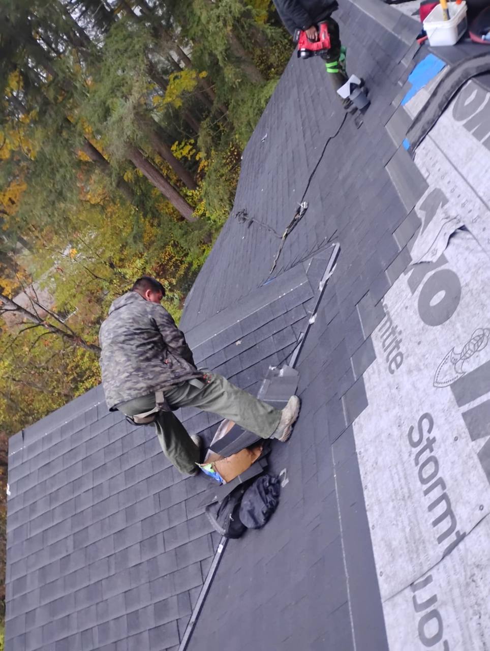 Shingling half finished on a Chilliwack roof