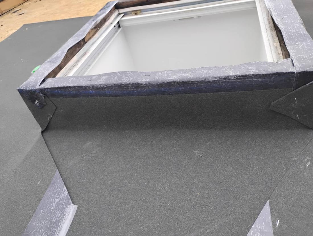 Skylight fully sealed with peel-and-stick membrane ready for flashing and shingling during Chilliwack residential re-roof by Fraser Roofing